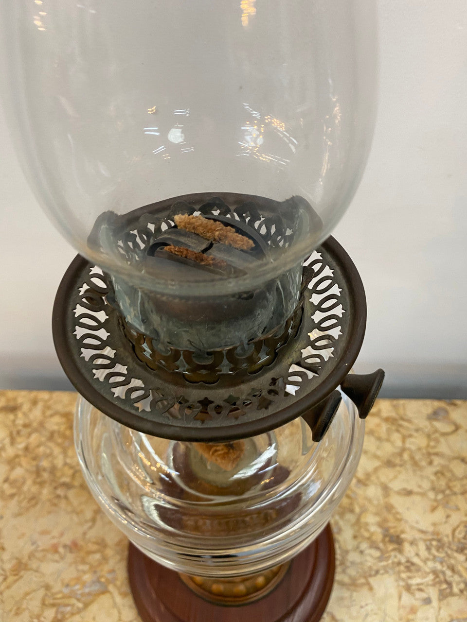 Edwardian ribbed glass kero lamp on a turned wooden base. Circa 1900's.
