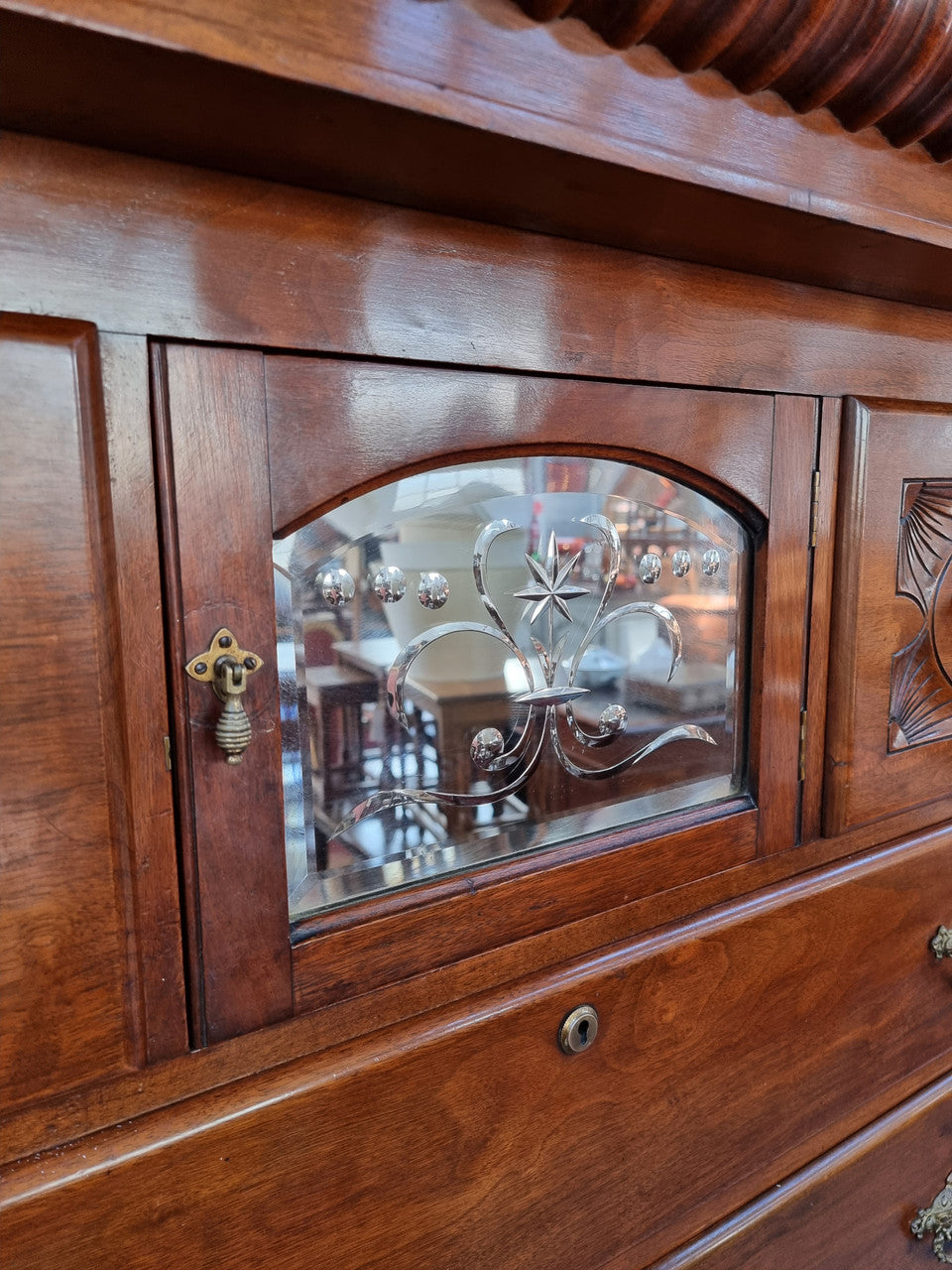 A 19th Century Scottish Mahogany tall boy/ chest of six drawers with small cabinet section at the top. Beautiful carvings and easily comes apart into three sections making transport for moving into place easy. In good original detailed condition.