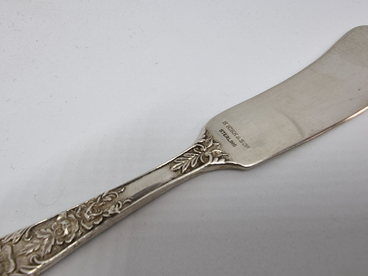 Very decorative American Kirk and Sons sterling silver butter knife in good original condition.