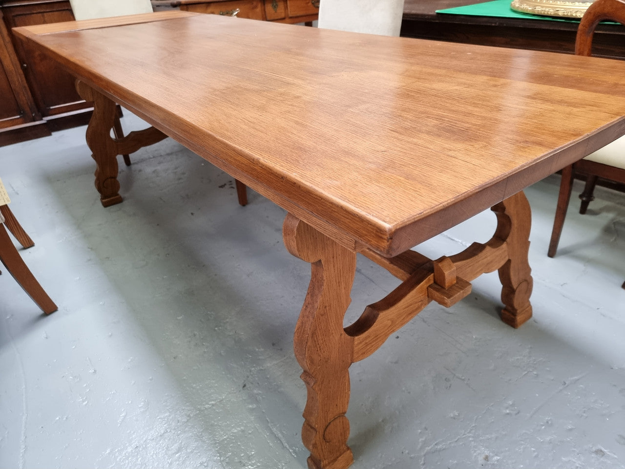 French light Oak Spanish style extension table. In good restored condition.