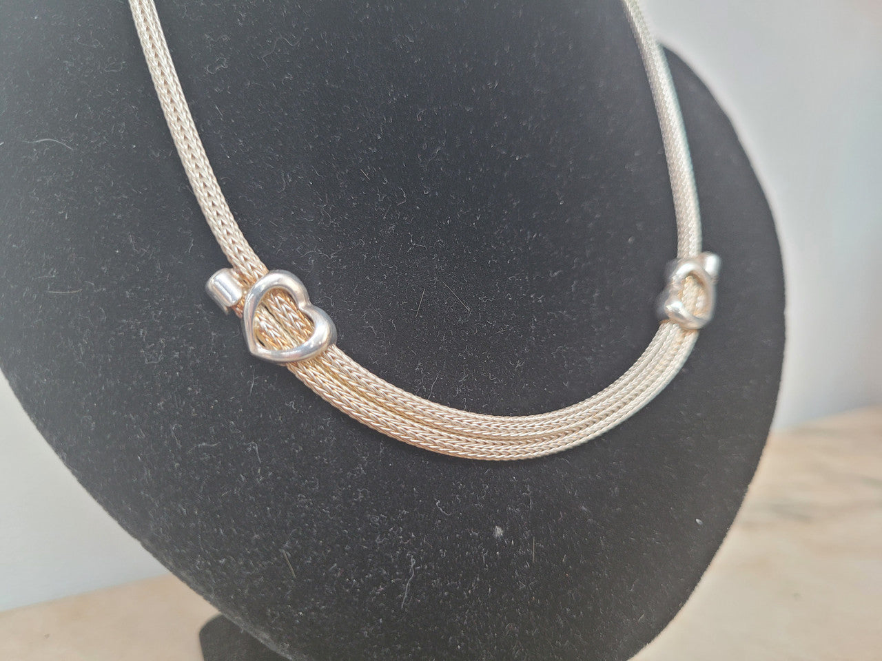 Beautiful Italian sterling silver woven double heart necklace. In good condition.