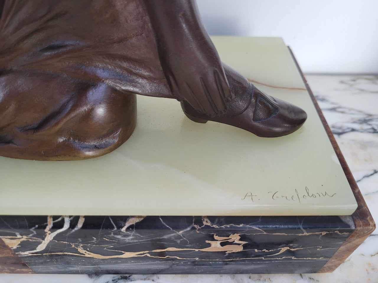 Art Deco bronze statue with brown patina of a lady and parrot on marble base. Signed by Italian Sculptor A Trefolini, an highly regarded sculptor, in very good condition.