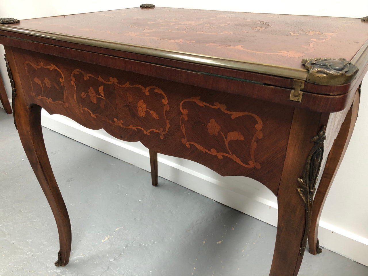 Beautiful french inlaid games table which includes internal drawers and bronze mounts. Internal drawers have counters and cards included.