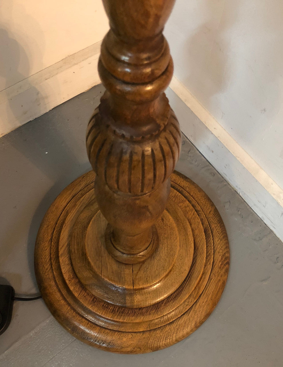 Tudor style Oak standard lamp, rewired and with foot switch. In good original condition.