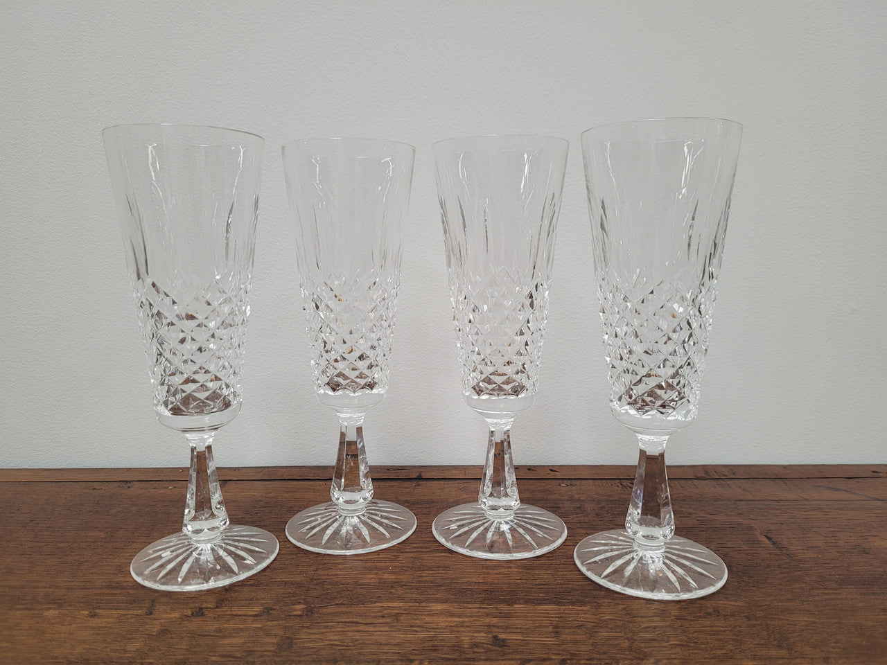 Set of four Waterford “Kenmare” pattern champagne flutes. In good original condition with no chips or cracks.