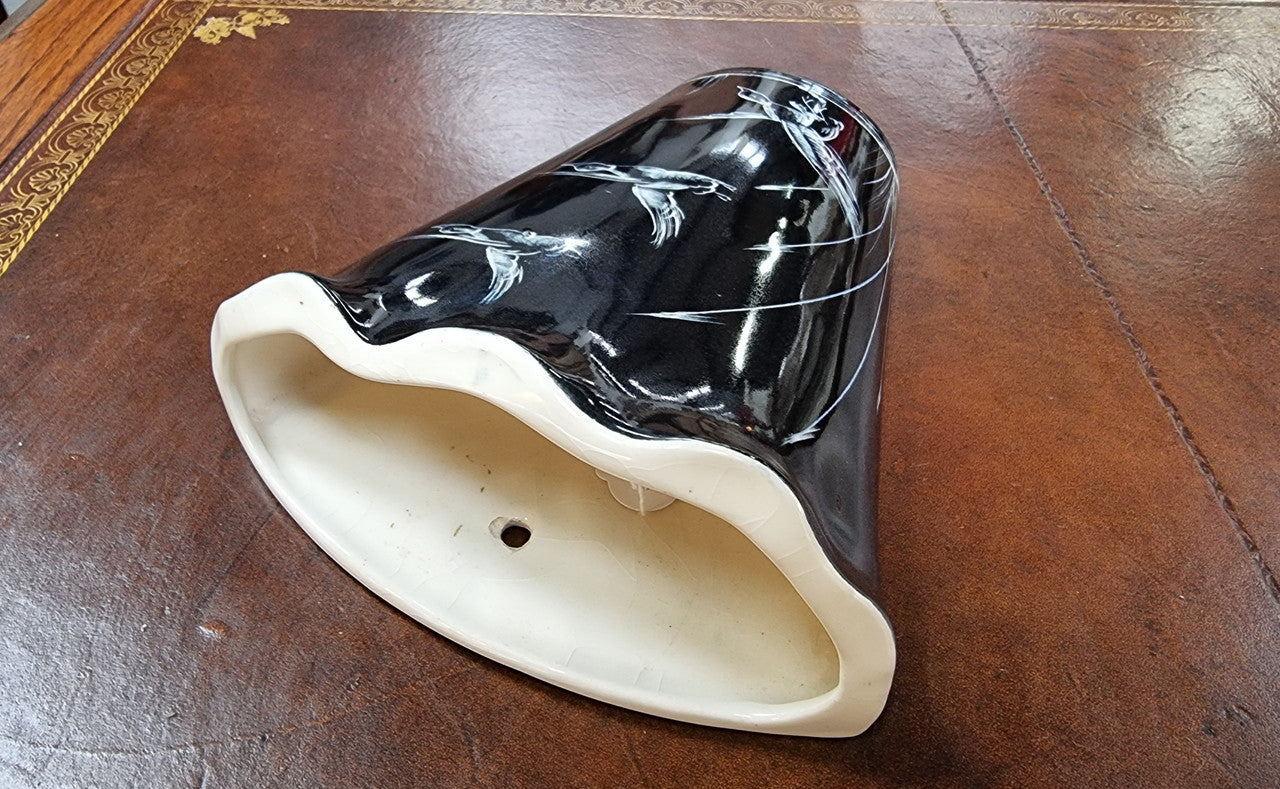 Charming vintage wall pocket vase. Black with hand painted cream ducks. Length 19.5cm Width 14.5cm Marked W26 on the rear.