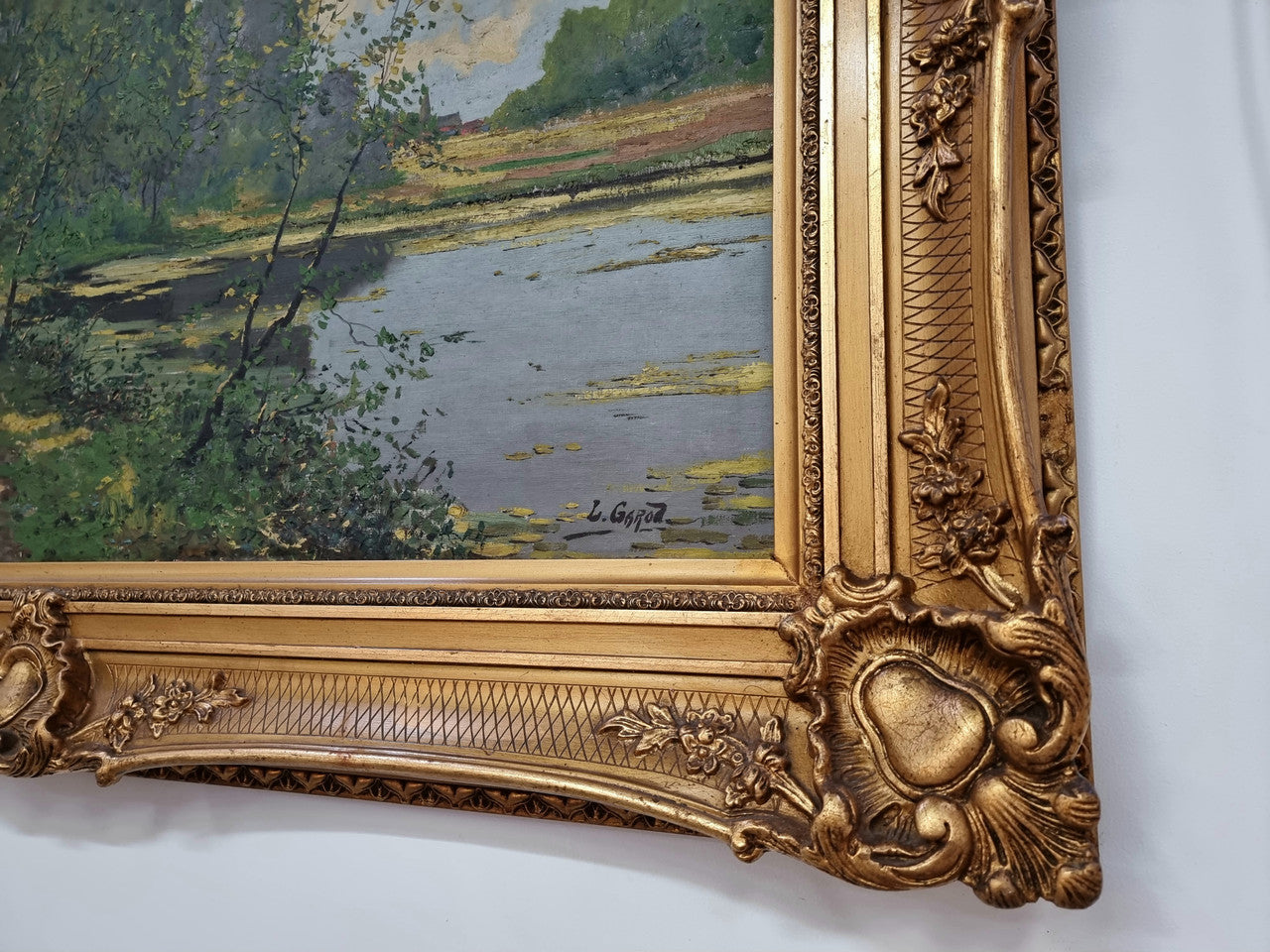 Sourced in France is this beautiful impressionist oil on canvas by "LOUIS GAROT". In a lovely ornate frame, signed and in good original condition.