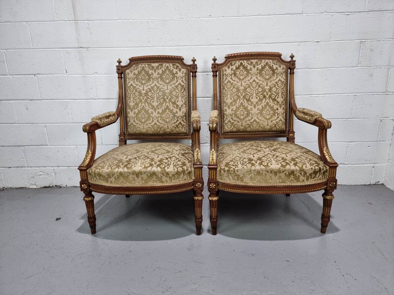 Beautiful French walnut Louis XVI style upholstered three piece Salon Suite. It has lovely fabric which is in overall good condition and is very comfortable to sit in. In good original detailed condition.