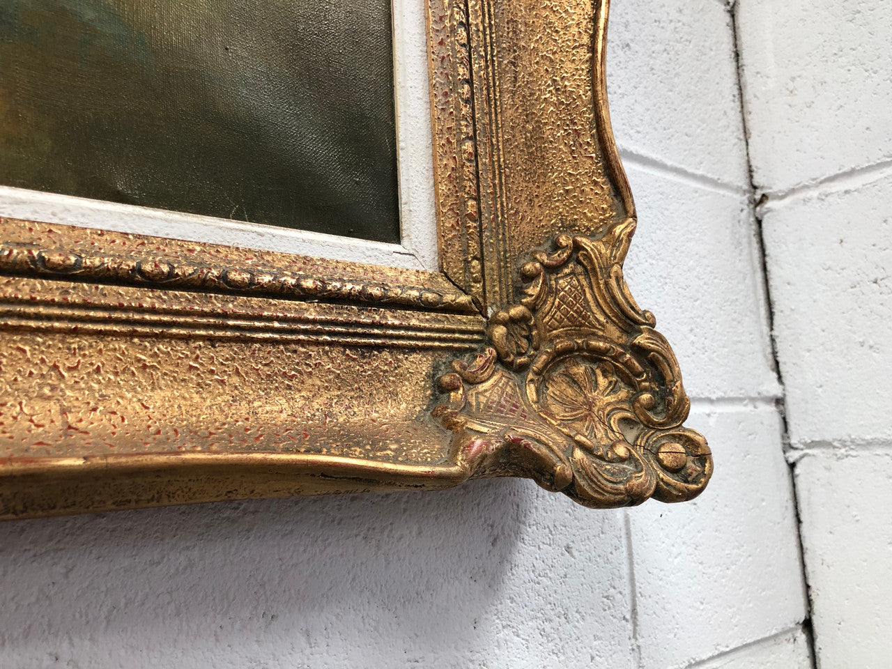Large French oil on canvas of "country cottage" scene in a beautiful ornate gilt frame. In good original detailed condition.