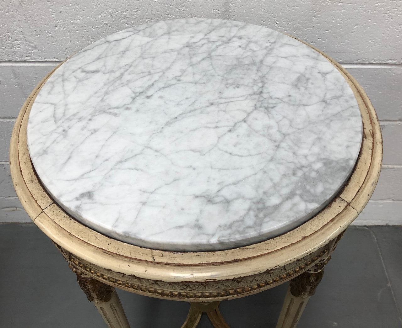 French Late 19th Century painted and gilded Walnut marble top occasional table. In good condition. CIrca 1900.