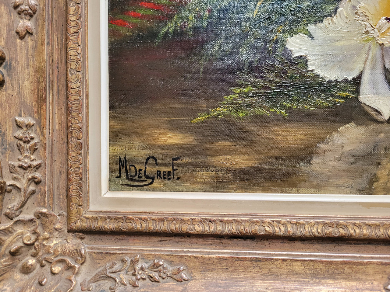 Stunning oil on canvas still life of flowers and vase painting in gilt frame. Sourced in France and signed by Belgium artist M.Degreef. It is in good original detailed condition.