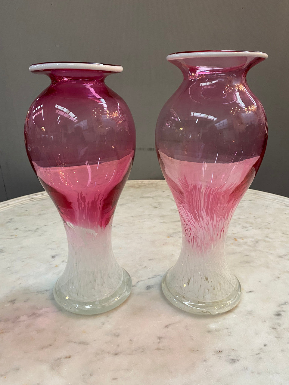 Pair of large Edwardian Ruby & Milk art glass vases. Handmade and in good condition. Circa 1900.