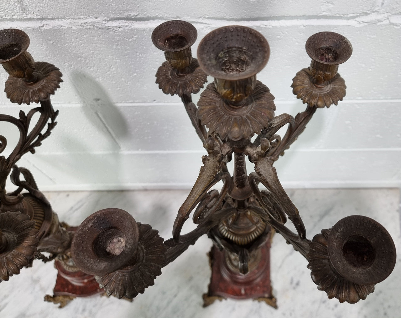 Pair of decorative Antique French spelter and marble candelabras. in very good original detailed condition.