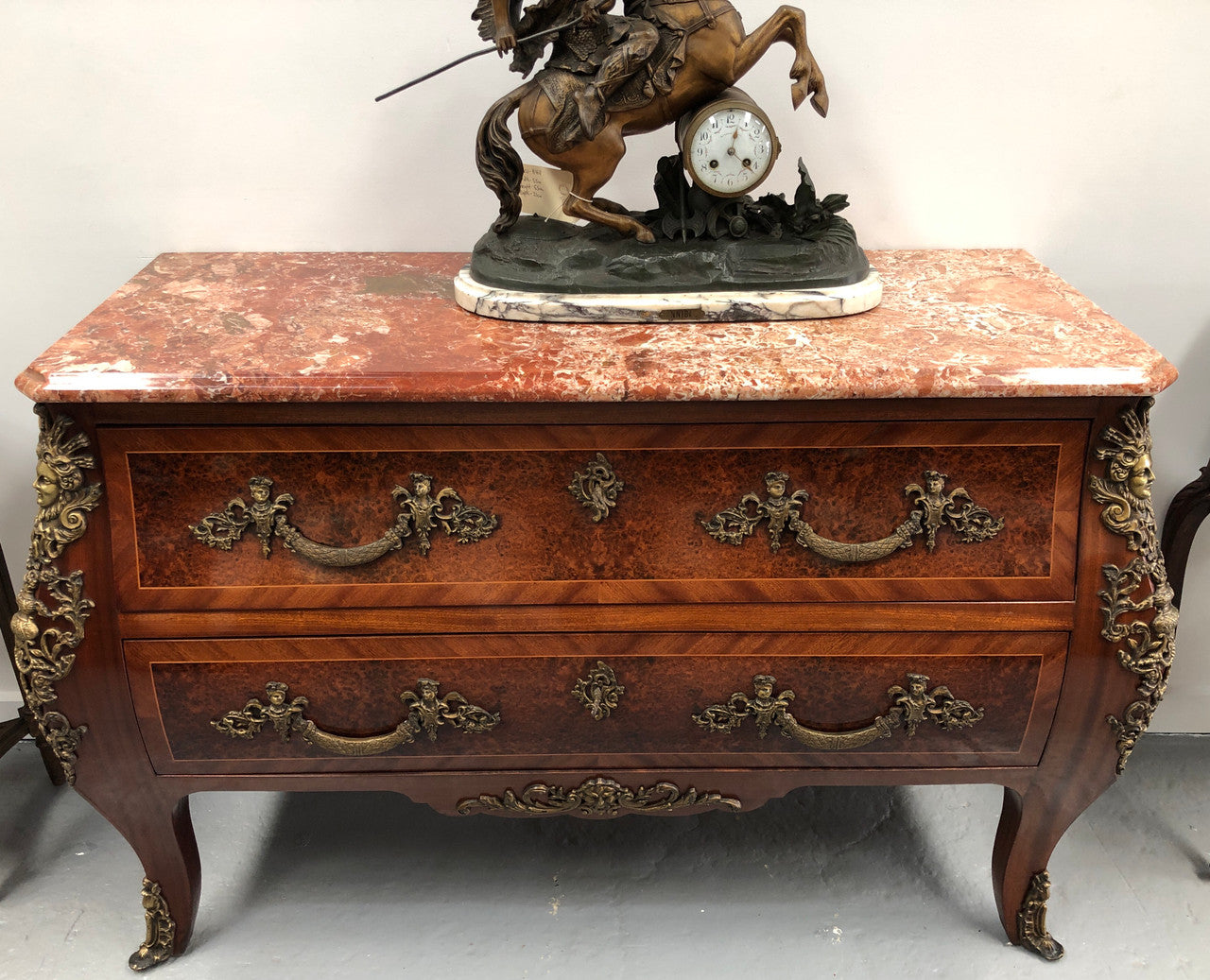 Grande French Louis XIV style Amboyna and walnut two drawer marble top commode, with amazing detailed ormolu mounts, and sienna colour marble top. In good original detailed condition.