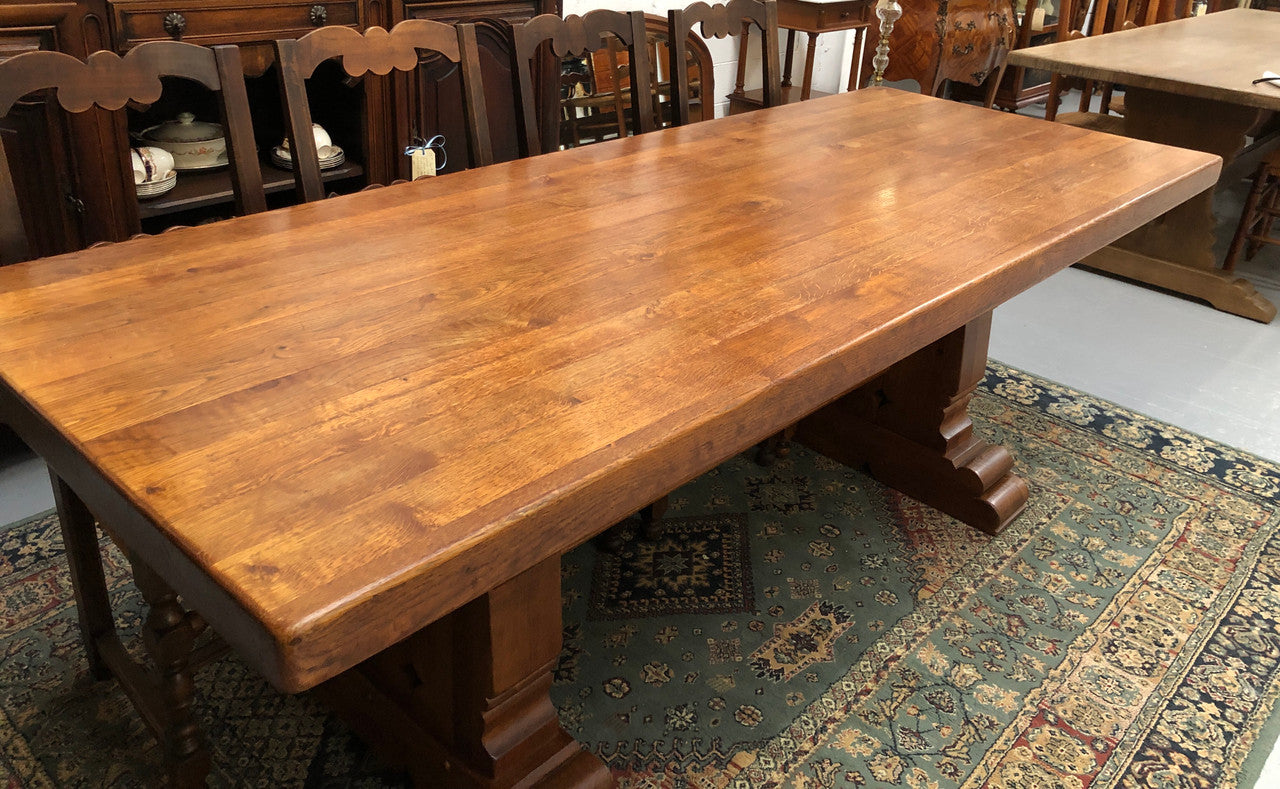 French Farmhouse table with a beautiful thick plank top and stretcher base. Can seat 8-10 people comfortably and is in good original detailed condition.