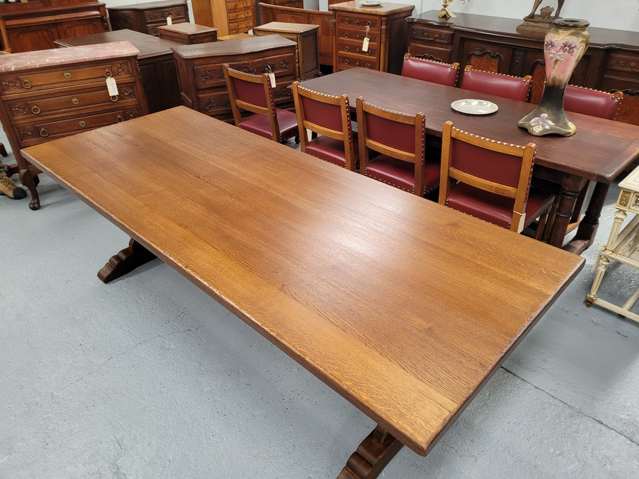 Sensational long French Oak farmhouse table of large proportions on a stretcher base. It has been fully restored with a hard oil water resistant finish. This fabulous table would seat 10 to 12 people.