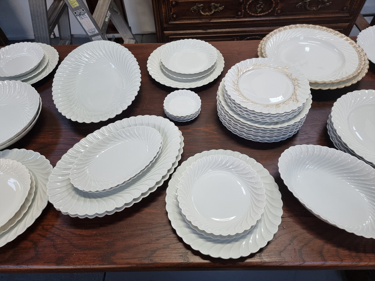 Limoge "Haviland" large white part dinner service. Includes some white service with gilt decoration. Although most items are in good condition please note two plates do have small chips. We are able to supply more photos on request.