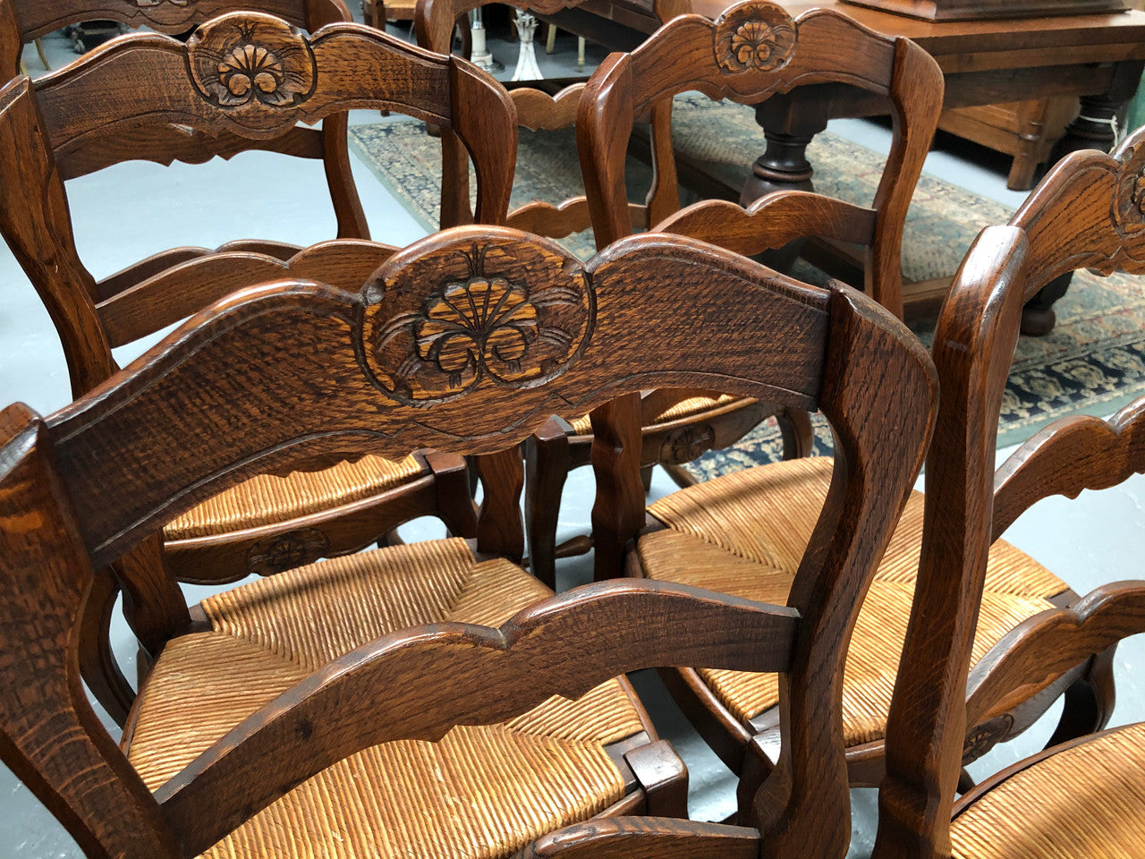 Antique Set of Six French Oak rush seat dining chairs. They are in good original condition and are very strong.