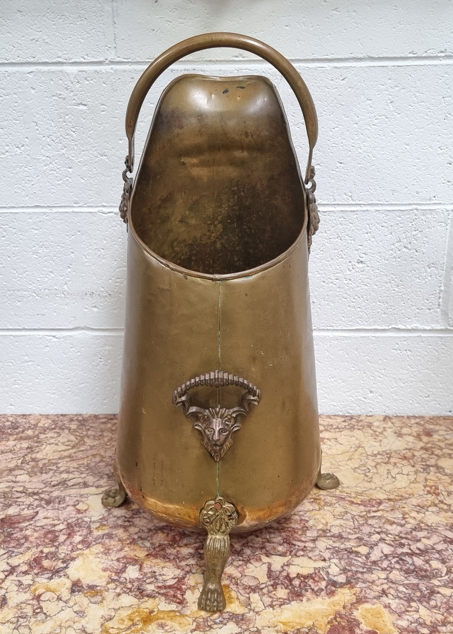 French brass coal bucket with Lion heads. In good original condition.