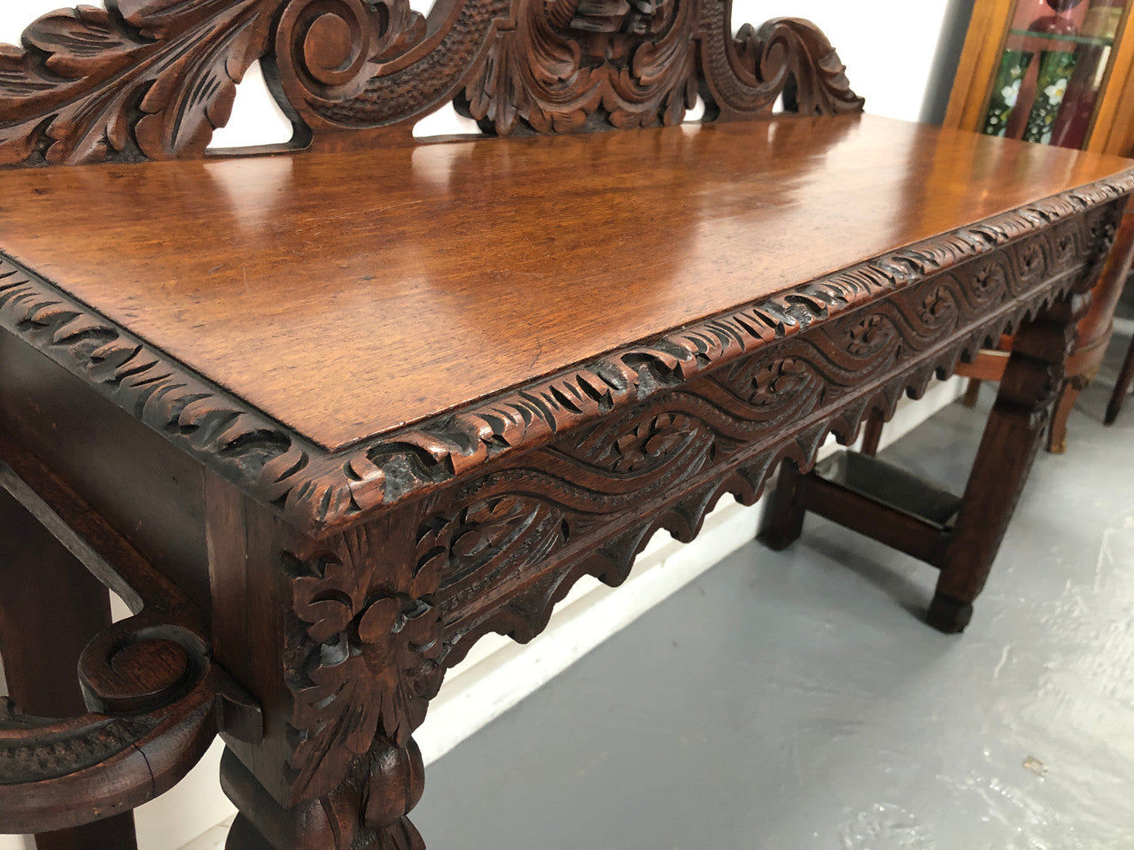 Superb 19th Century Gothic style hall/console table. It has umbrella and walking stick holders on both sides. In good original detailed condition.