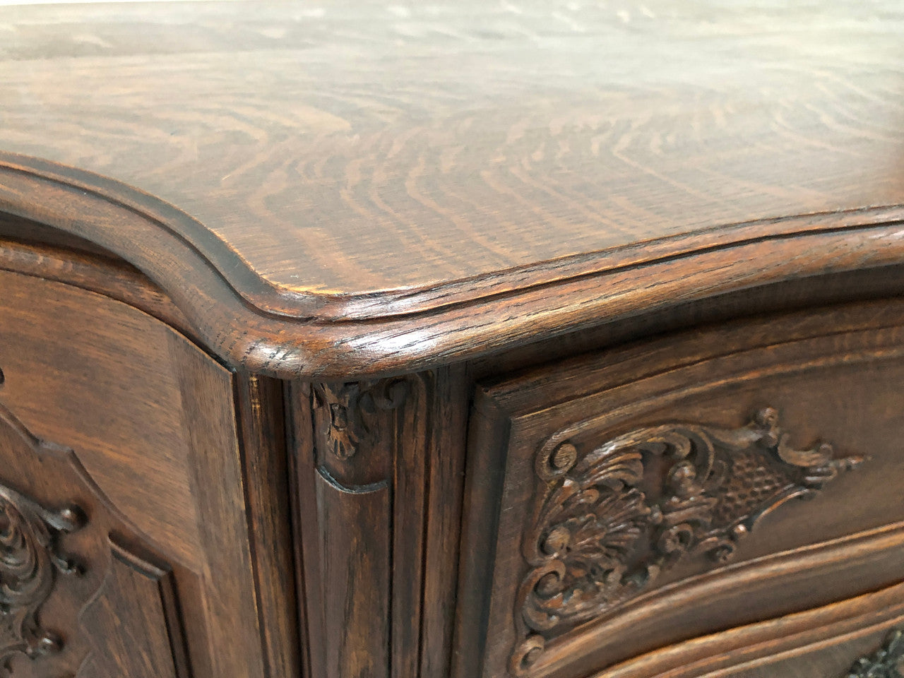 French Louis XV style dark Oak carved, two door and three drawer Commode /side cabinet. Could also be used as a TV cabinet or in the bedroom as storage very versatile. In good original detailed condition.