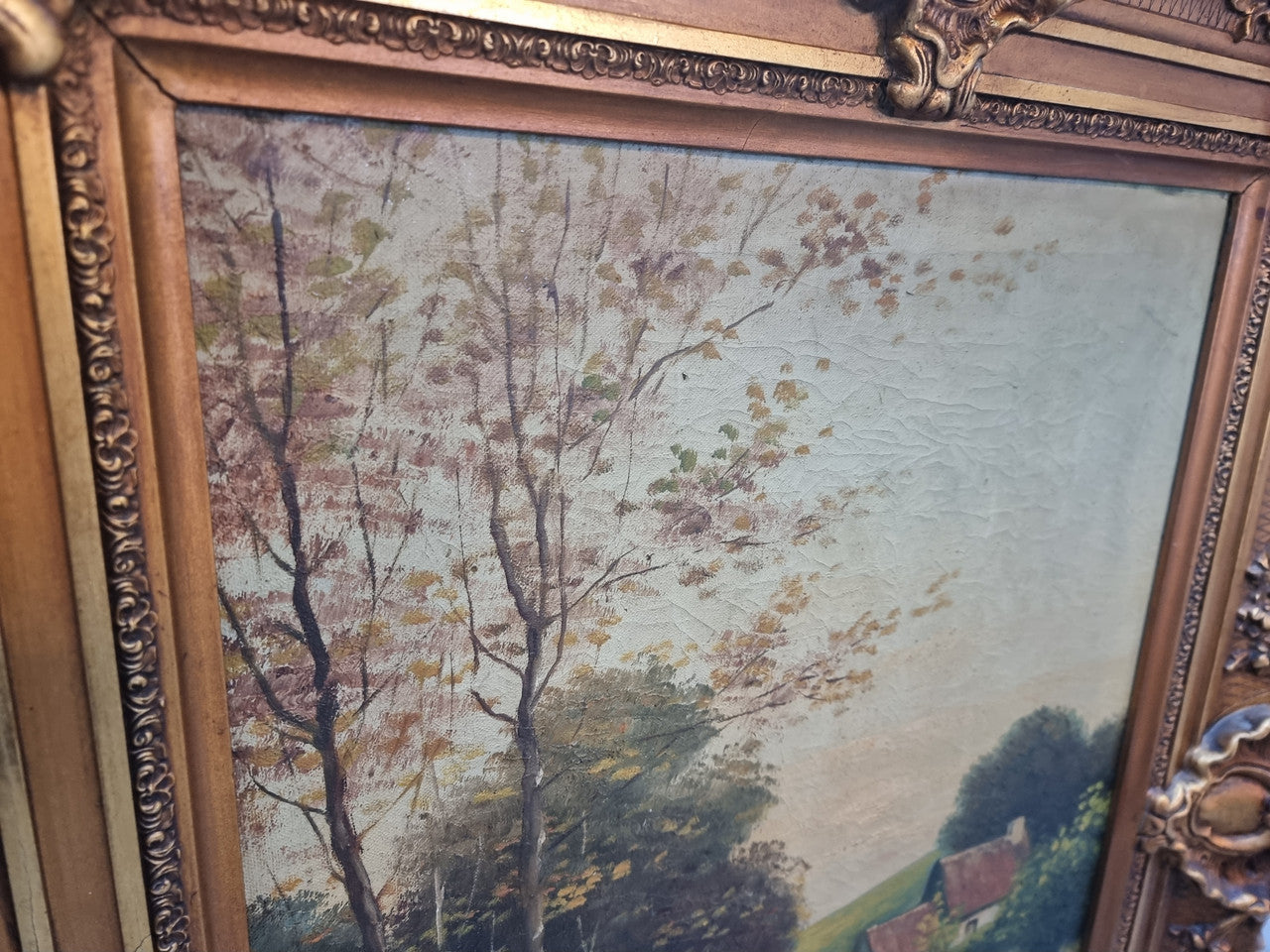 Lovely signed landscape river scene oil on canvas framed in a beautiful ornate frame and in good original condition.
