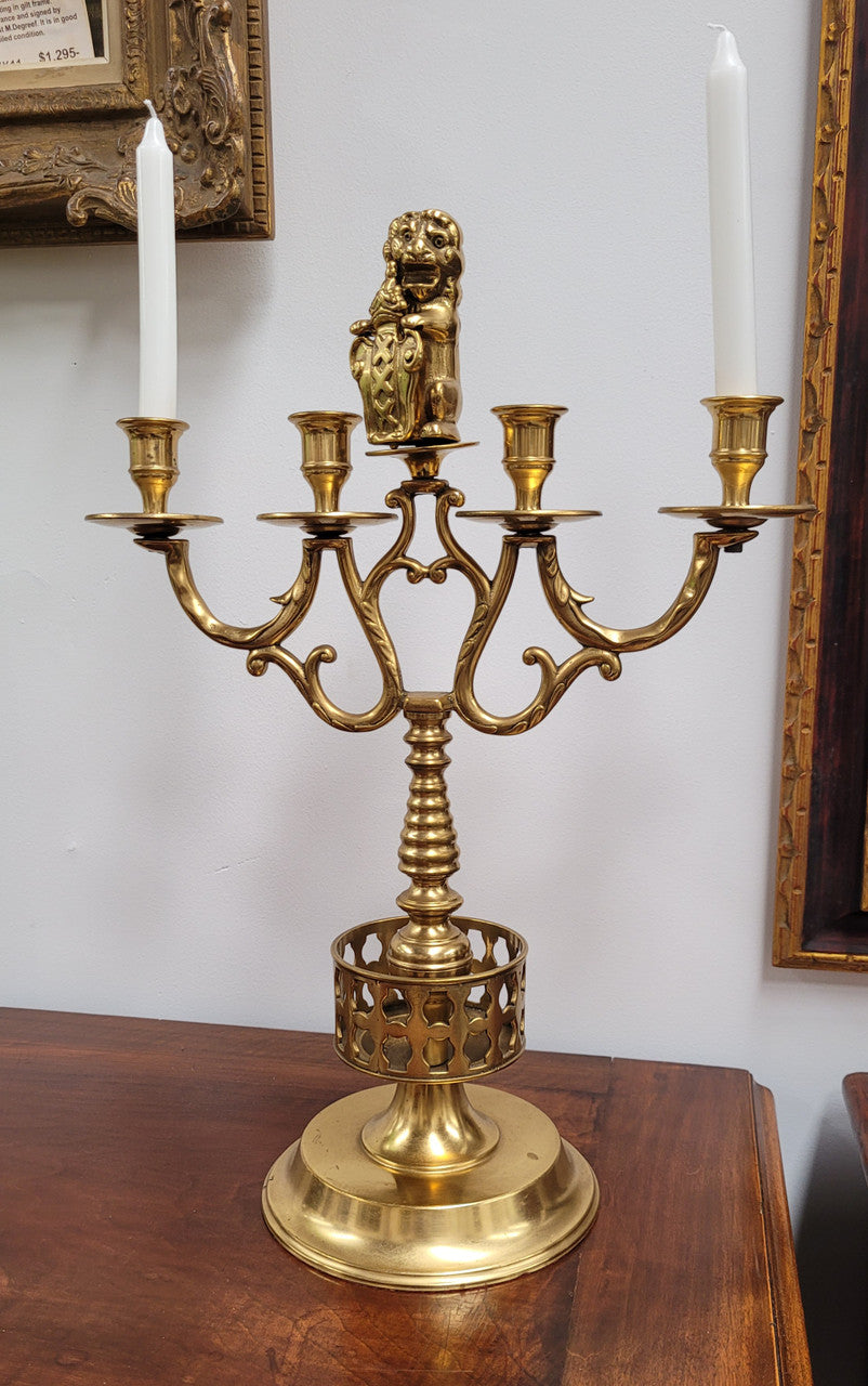 Pair of large Antique French Brass candelabras with lions. They have been sourced from France and are in good original detailed condition.