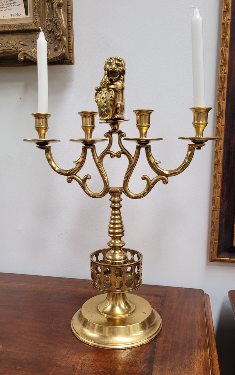 Pair of large Antique French Brass candelabras with lions. They have been sourced from France and are in good original detailed condition.