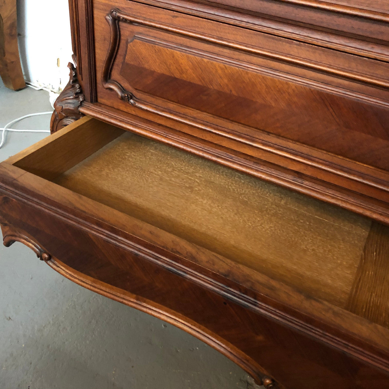 19th Century French Walnut five-drawer marble top commode. In good original detailed condition.