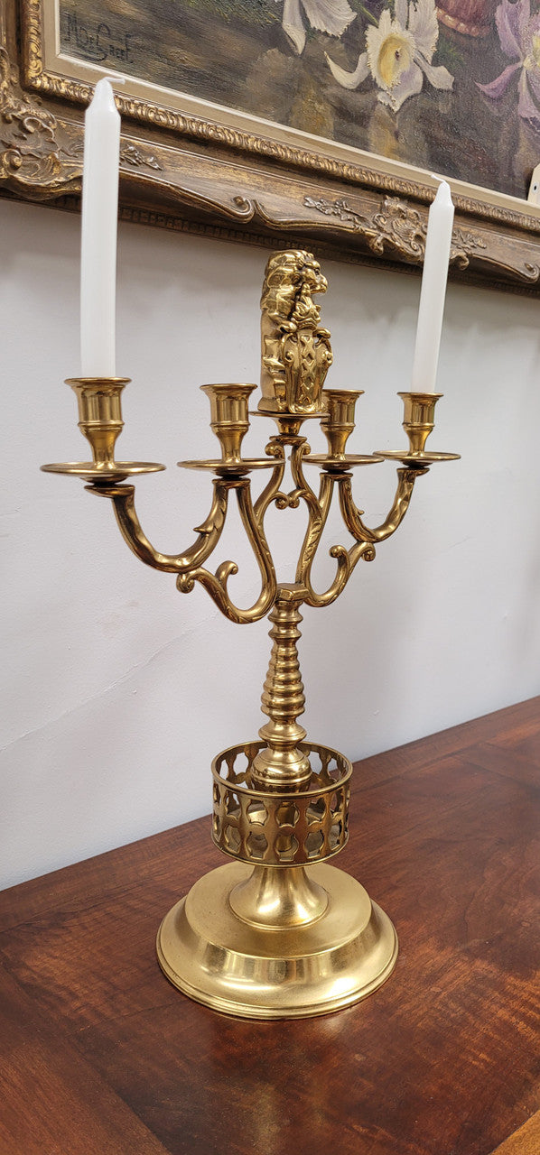 Pair of large Antique French Brass candelabras with lions. They have been sourced from France and are in good original detailed condition.