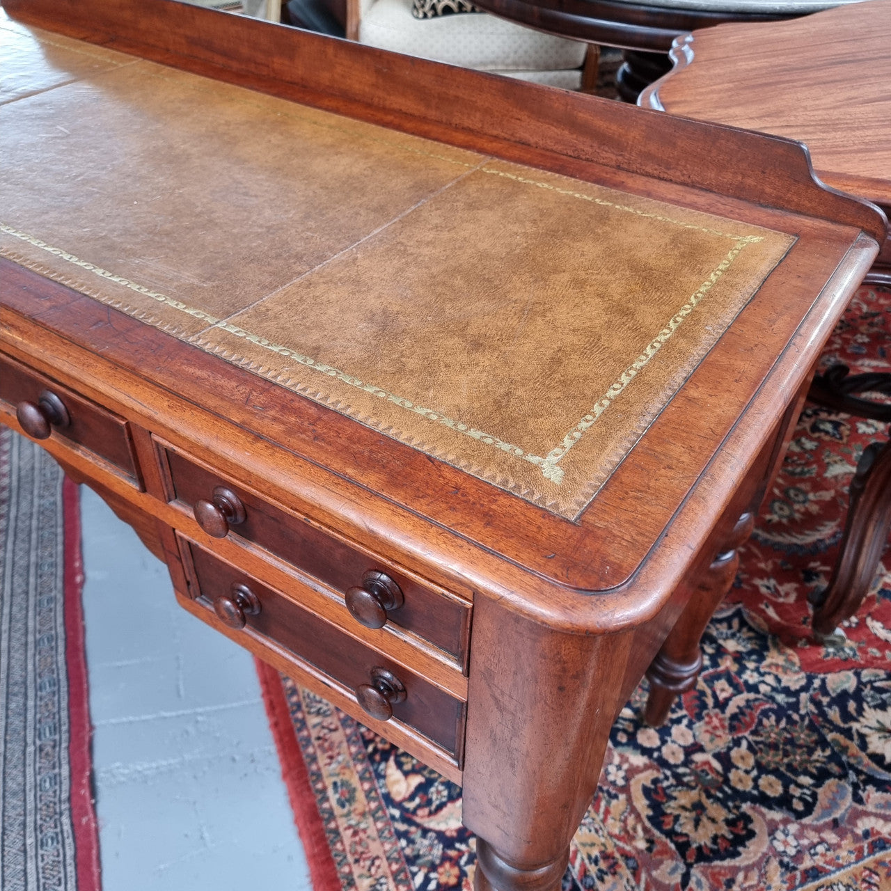 Lovely Victorian Cedar leather tooled top desk, with five drawers on castors and of pleasing proportions. In very good original detailed condition and has been sourced locally.