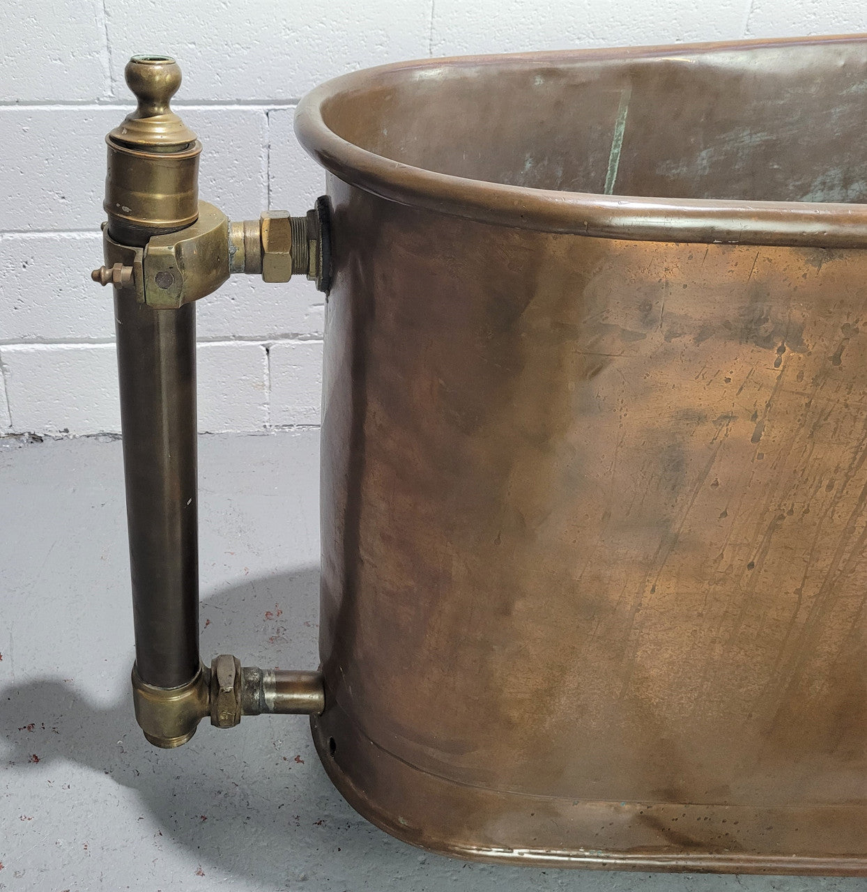 Sourced from France a rare full copper Antique bath tub on feet and includes an overflow, fittings, taps ect. In good original condition.