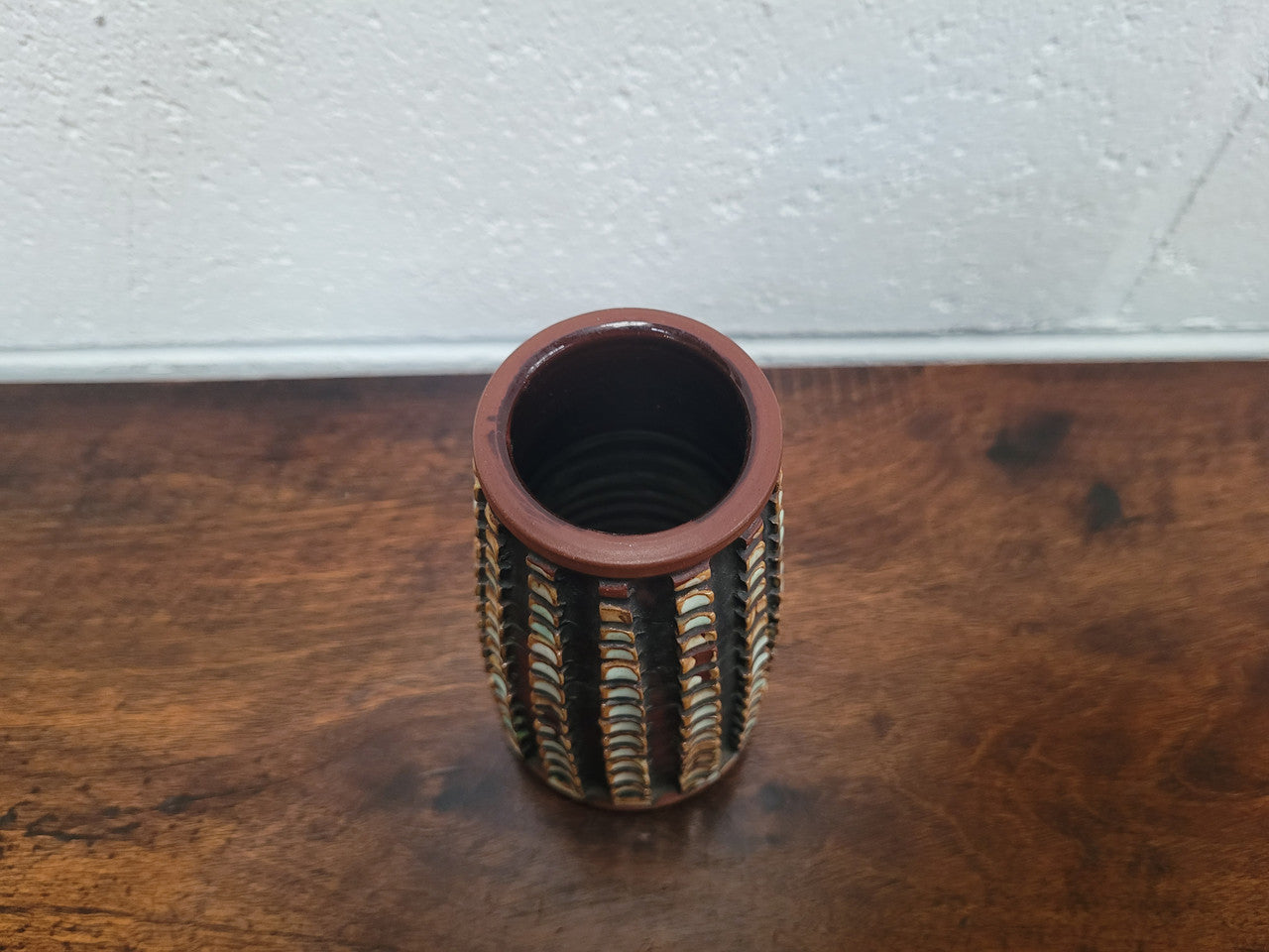 Poole Pottery carved Atlantis Vase by "Guy Sydenham". Shape 20 size 2. Very Tactile. 13cm tall.
