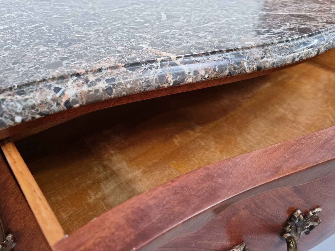 Beautiful French walnut Louis XV style two drawer commode. With a lovely floral marquetry inlaid design and marble top. It is in good original detailed condition.