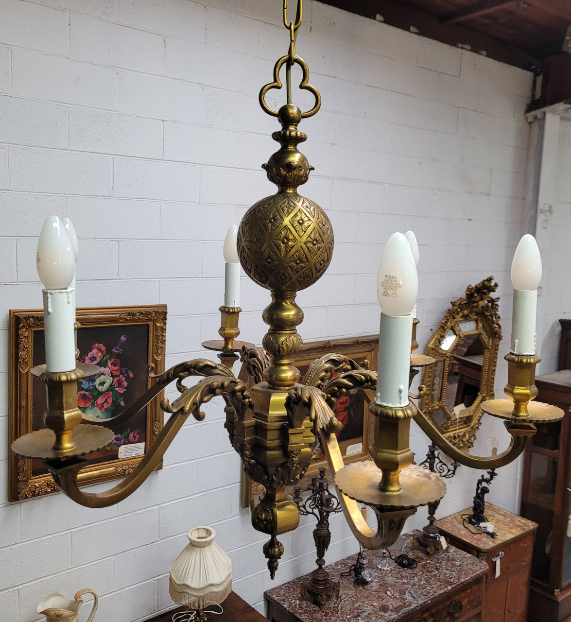 Stunning six arm French bronze chandelier. It can be used with or without shades. It has been fully rewired to Australian standards. It is in good original detailed condition.