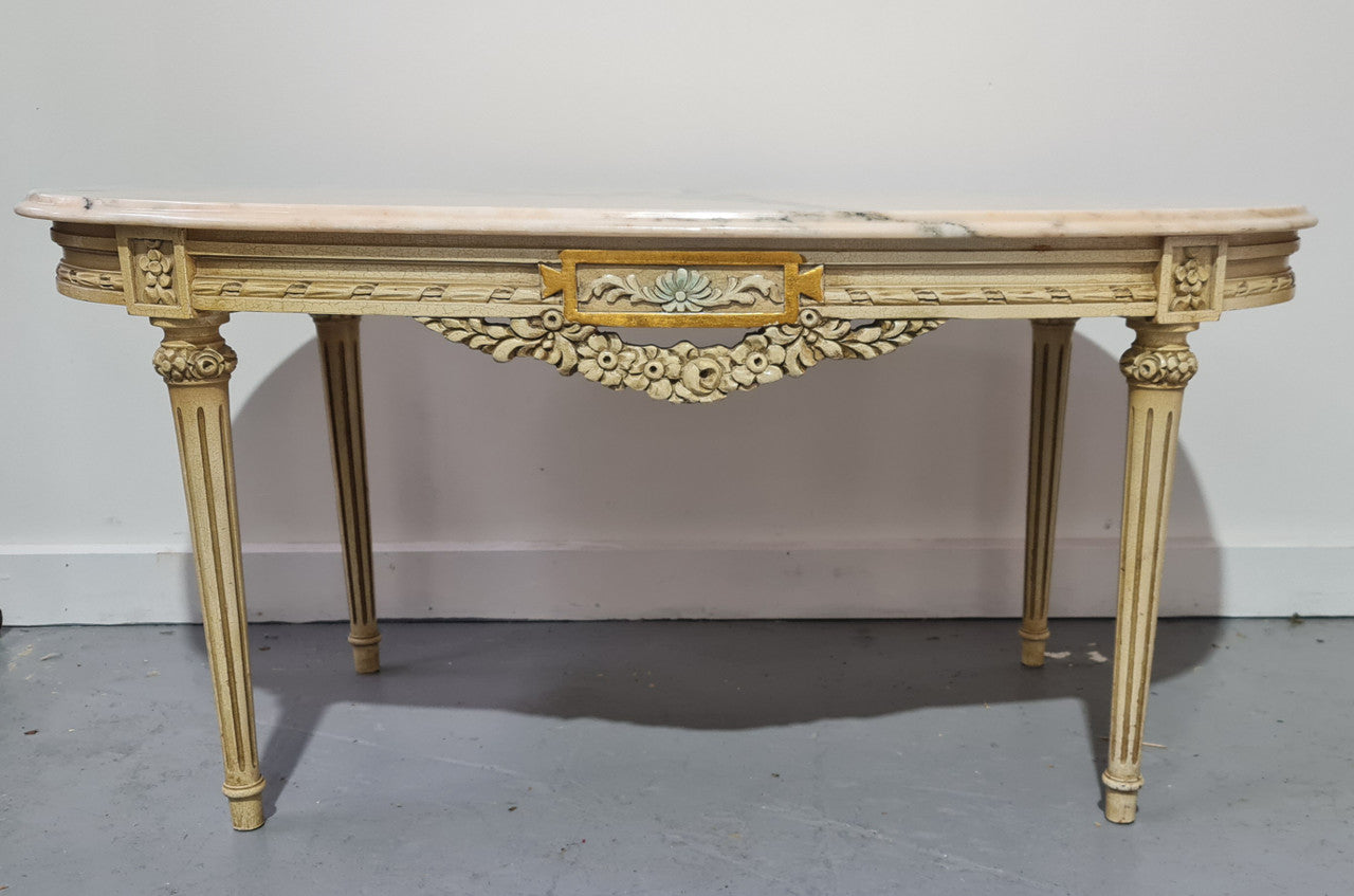 Charming painted Louis XVI style oval marble top coffee table. In good original detailed condition.