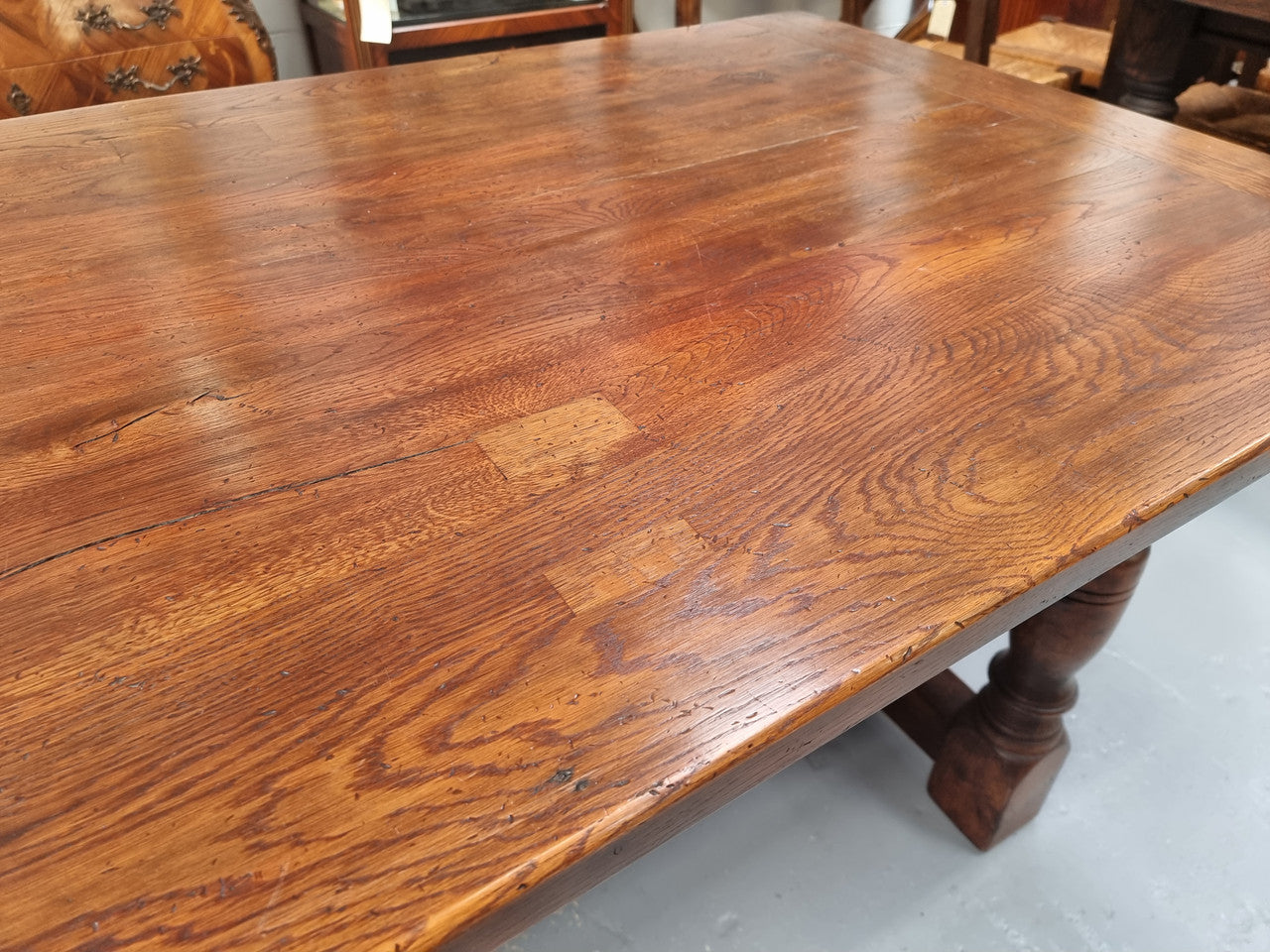 Vintage French Oak stretcher base farmhouse table. It is in good original condition.