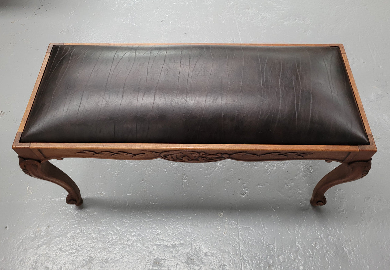 French Oak newly upholstered leather look duet stool. In good original detailed condition and new upholstery.