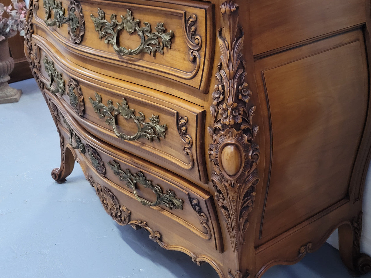 Impressive Louis XV style three drawer walnut commode. Ormolu handles and bevelled marble top complimenting detailed carving. In very good original detailed condition.