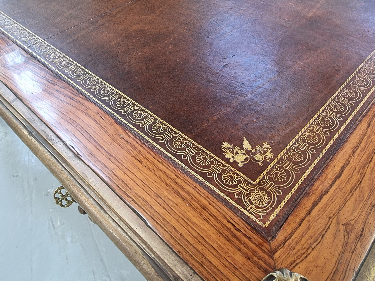 Beautifully fully restored French Antique Rosewood partners desk with beautiful ormolu detail and lovely tooled new leather top. There are three functioning drawers on one side for all your storage needs.