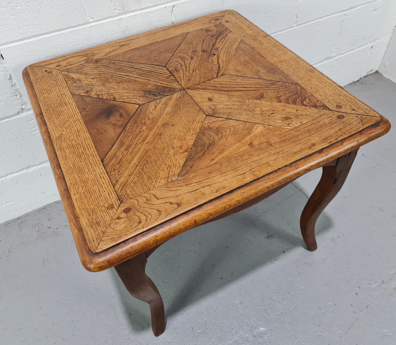 Gorgeous Louis 15th parquetry top sofa side table. In great detailed original condition.