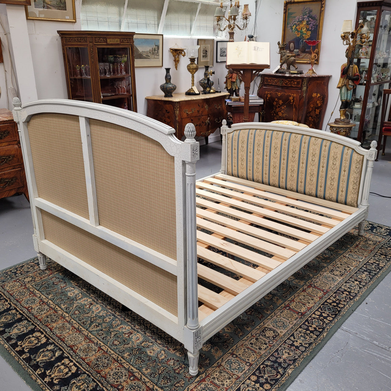French Louis 16th style double bed and rails with original crackle paint. It also has good quality upholstery. Bed comes complete with custom made slats. Just place your mattress on top. Sourced from France and in good original detailed condition.