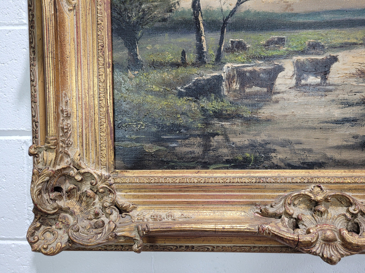A stunning painting sourced in France signed oil on canvas of "Cows In River Landscape". Framed in a magnificent gilt frame and is in good original detailed condition.