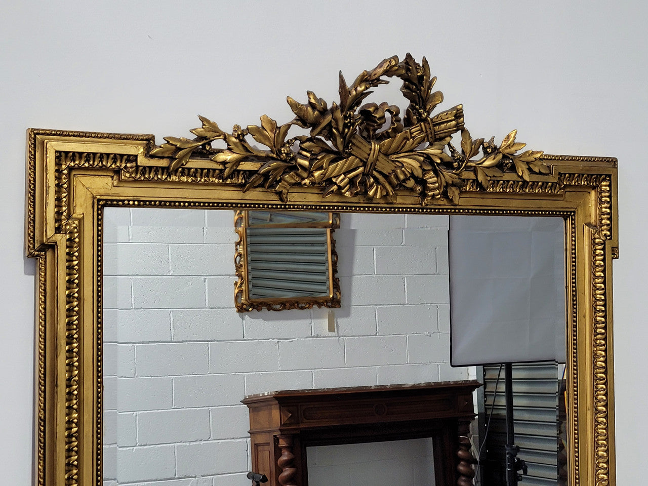 Substantial Louis XI style French Antique over mantel mirror. It is in very good restored condition.