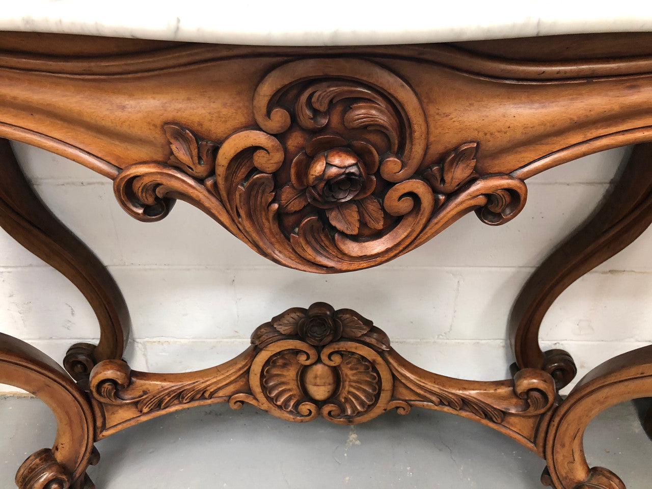 19th Century Louis XV style beautifully carved console table. With detailed ornate carving and a beautiful marble top. In good original detailed condition.