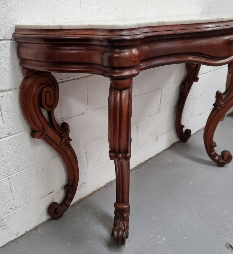 19th Century French Mahogany marble top console table. Louis XV style with white marble top and single drawer. Sourced from France and in good original detailed condition.