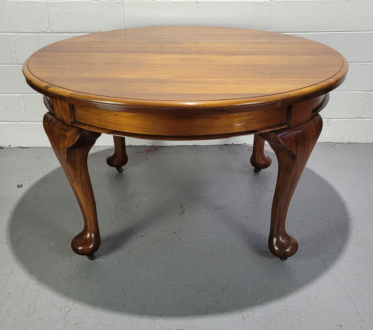 Period blackwood two leaf extension table. It can comfortably sit six people and eight when extend. It is in good original detailed condition.