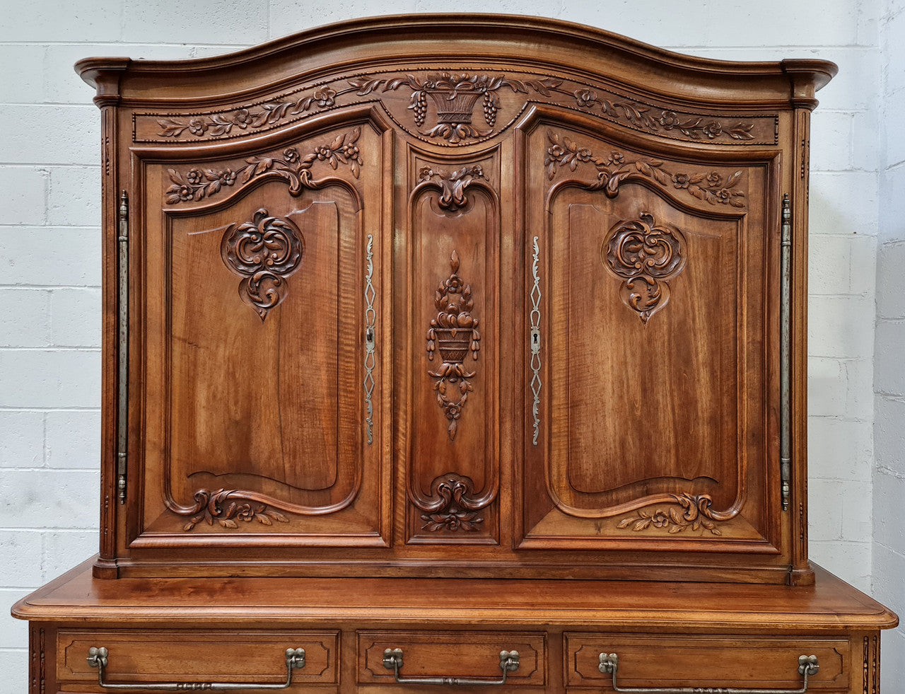 Beautiful 19th century Walnut Louis XV style sideboard with plenty of storage space. The top has two doors that open up to three adjustable shelves. It is in good original detailed condition.