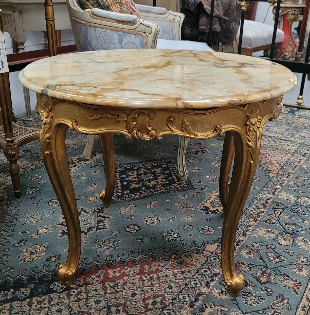 French Louis XV style gilt wood marble top coffee table or side table. It has been sourced from France and is in good original detailed condition.