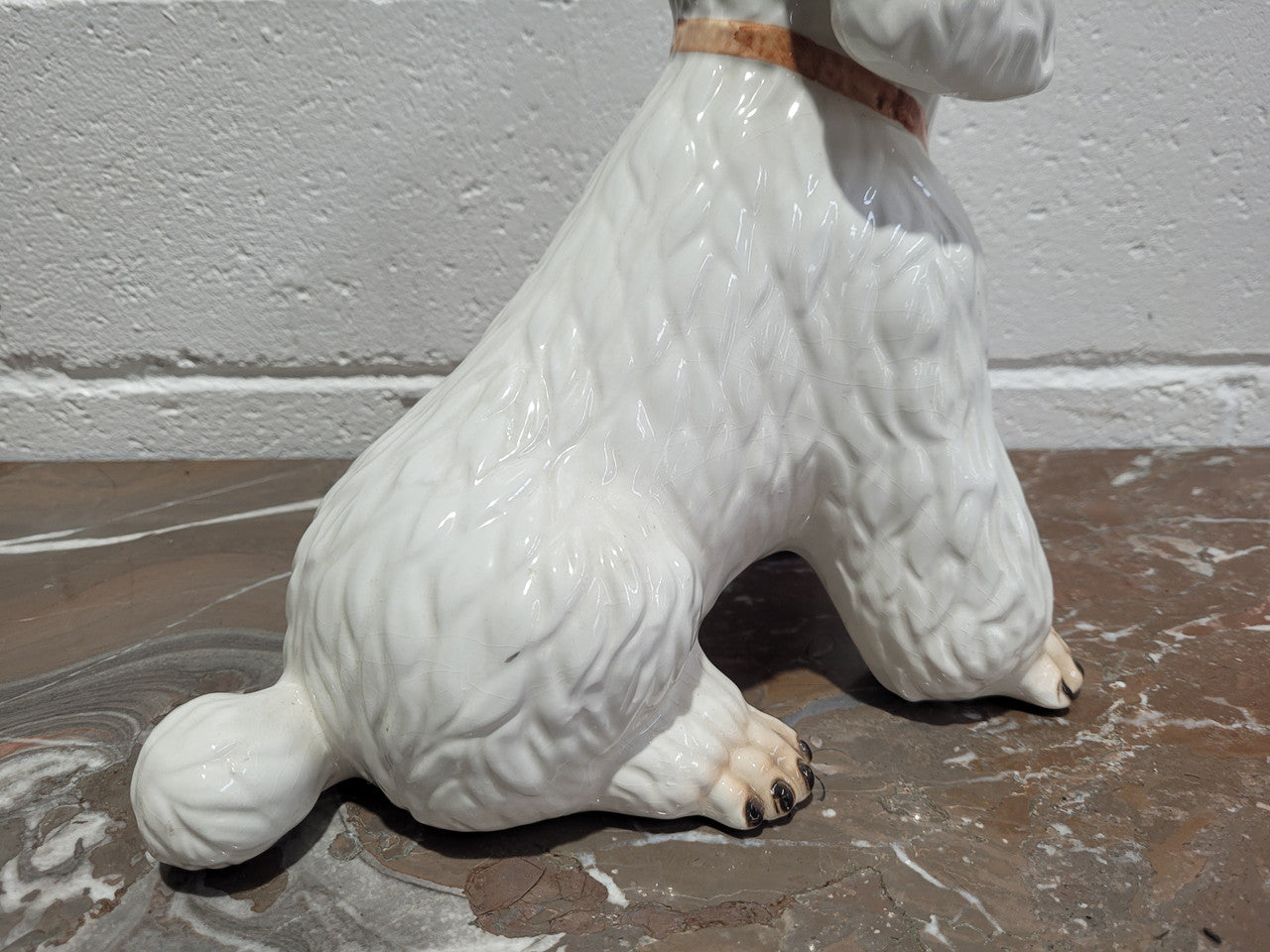 Vintage Italian ceramic Poodle figurine. It is beautifully detailed and in good original condition with no chips or cracks does have crazing to glaze.